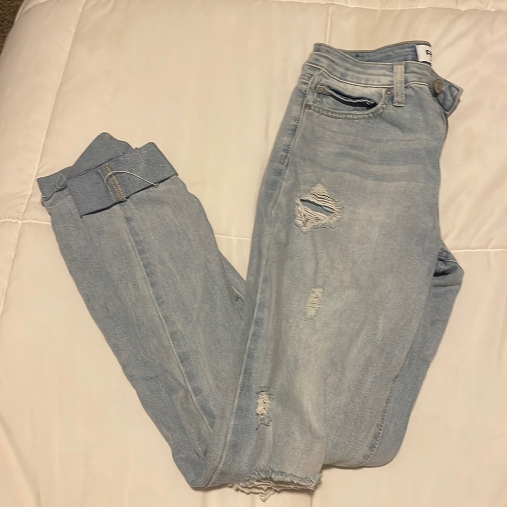 Barley worn ripped jeans